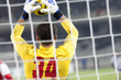 Goalkeeper catching the ball