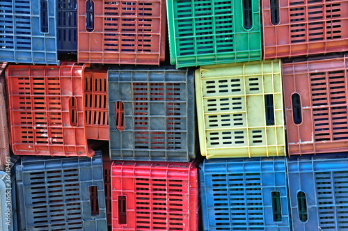 Photo: colorful plastic crates background colorful plastic crates background
