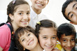 Happy group of children friends together outdoor, portrait