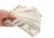 dollars in a human hand dollars in a human hand