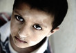 Photo: Portrait of poverty, little boy with sad eyes Portrait of poverty, little boy with sad eyes