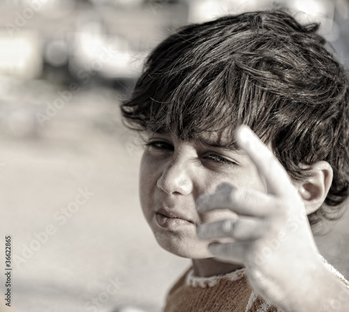 Photo: You are also responsible for this! Poor child with finger up. You are also responsible for this! Poor child with finger up.