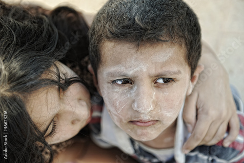 Photo: Little dirty brother and sister, poverty , bad condition Little dirty brother and sister, poverty , bad condition