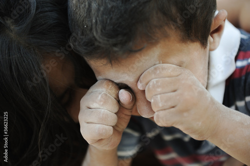 Photo: Little dirty brother and sister, poverty , bad condition Little dirty brother and sister, poverty , bad condition