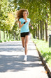 Foto: Junge Frau beim joggen Junge Frau beim joggen