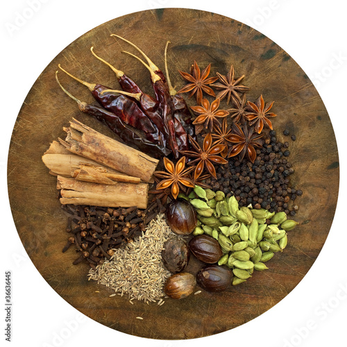 Foto: Mixed Spices on a Wooden Chopping Board Mixed Spices on a Wooden Chopping Board