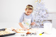 Cute girl baking cookies