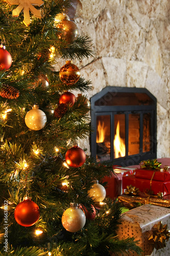 Photo: Christmas tree and fireplace Christmas tree and fireplace