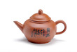 Chinese clay teapot isolated over the white background