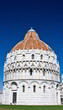 Baptistery of Pisa on blue sky