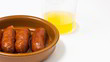 Sausages and cider out of focus