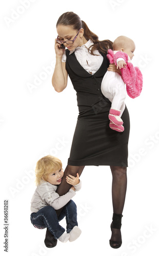 Foto: Young business lady with her little children Young business lady with her little children