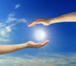 A hand is reaching out in the sky for help