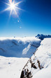 Sun and clouds over mountains