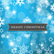 Christmas blue background with snow flakes.