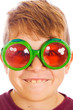 Funny looking kid with bug eyed glasses