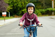 Young boy riding a bike