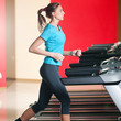 Gym exercising. Run on on a machine.