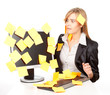 overworked business woman with stickers on computer