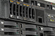 servers stack with hard drives in a datacenter servers stack with hard drives in a datacenter