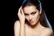 Model with evening fashion make-up, brunette hairstyle