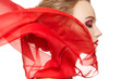 Model with waving red silk scarf. Vamp style, lady in red