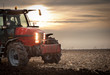 plowing at dusk