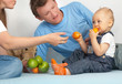 Kid in the family eats tangerines. Kid in the family eats tangerines.