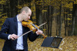 young man performing in nature