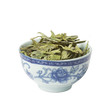 Bowl with loose green dry tea, isolated Bowl with loose green dry tea, isolated