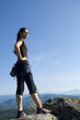 Pretty Young Woman on Cliff