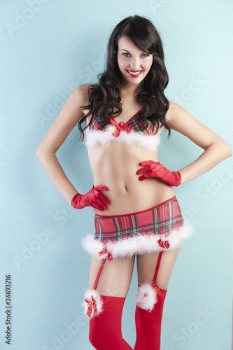 Photo: fashion shot of sensual christmas girl, she's looking at the len fashion shot of sensual christmas girl, she's looking at the len