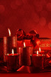 Christmas candles on a red background