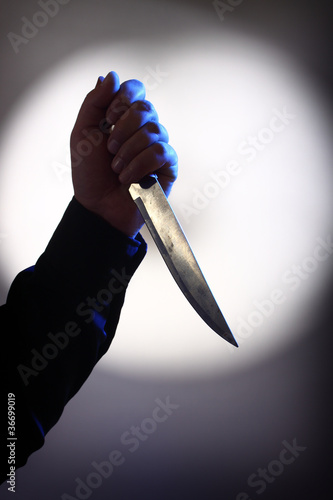 Photo: hand hoding khife hand hoding khife
