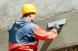 Facade Plasterer at work