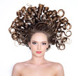 Model with beauty long curly hair - isolated on white