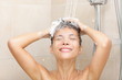 Photo: Woman in shower washing hair Woman in shower washing hair