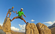 Photo: Rock climbing team reaching the summit. Rock climbing team reaching the summit.