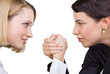 Two business women look at each other's eyes
