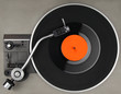 Photo: Vintage record player with vinyl phonorecord Vintage record player with vinyl phonorecord