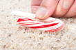 Candy cane stuck to carpet