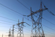high voltage electrical towers in line
