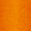 Old wall with weathered orange paint