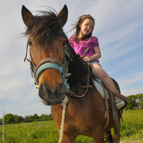 Photo: girl and pony girl and pony