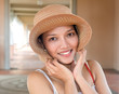 portrait of a young woman in a hat..