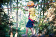 6 year old Kid climbing trees in Dolomites, Italy.