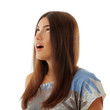 teenager girl beautiful looking up into the corner isolated on w