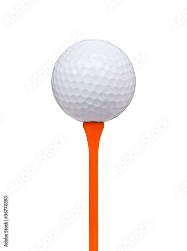 Photo: golf ball on tee isolated with clipping path golf ball on tee isolated with clipping path