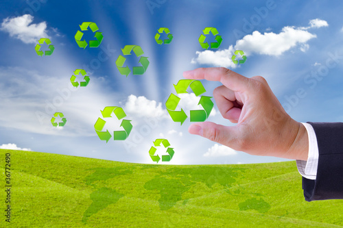 Photo: hand holding recycle sign hand holding recycle sign