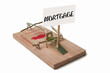 Mousetrap with mortgage sign